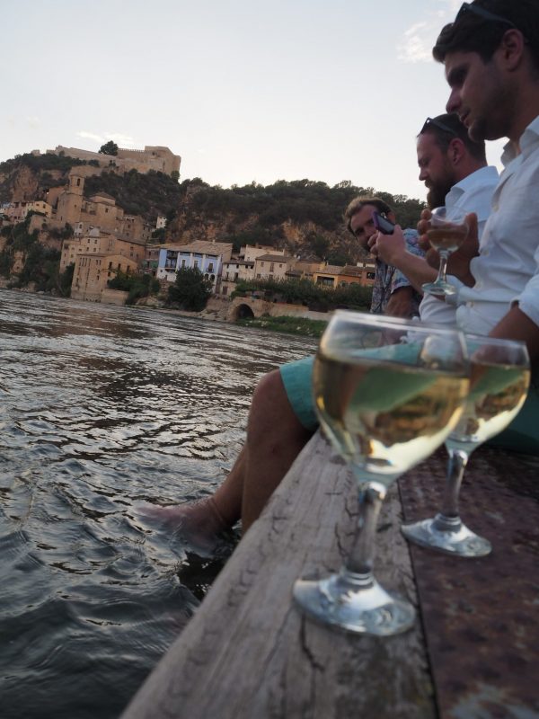 saving money by drinking our own wine outside on holiday