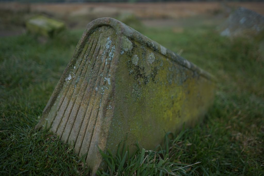 a concrete book on a walk in Haworths moorlands