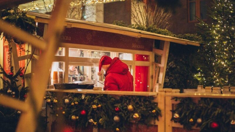 a santa buying some hot chocolate at one of the best christmas markets in england