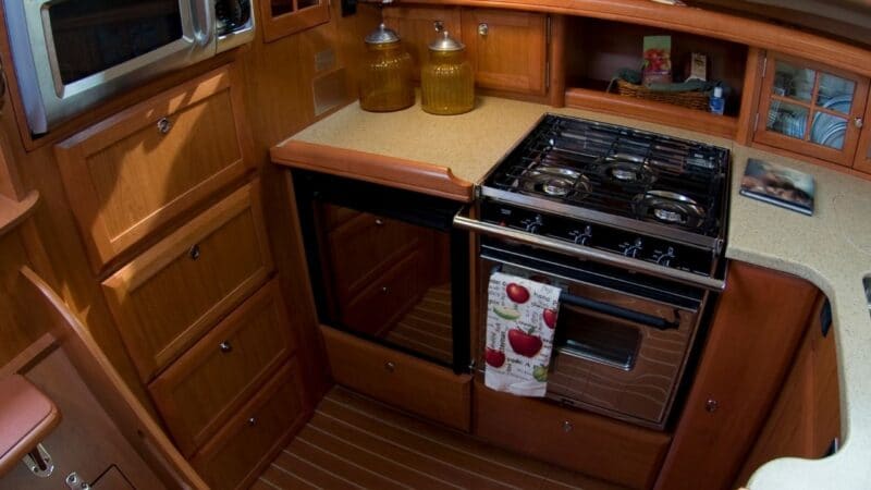 a sailboat galley filled with liveaboard books