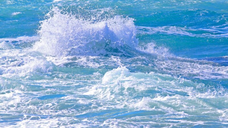 Frothy waves breaking at sea