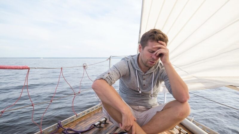a sailor with seasickness