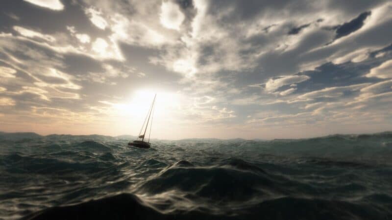 a sailing boat crossing the atlantic in rough weather
