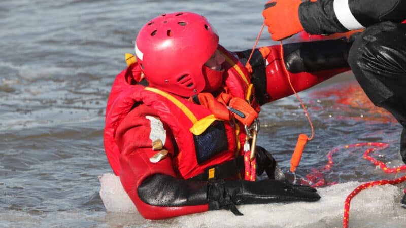 someone in the water in icy conditions