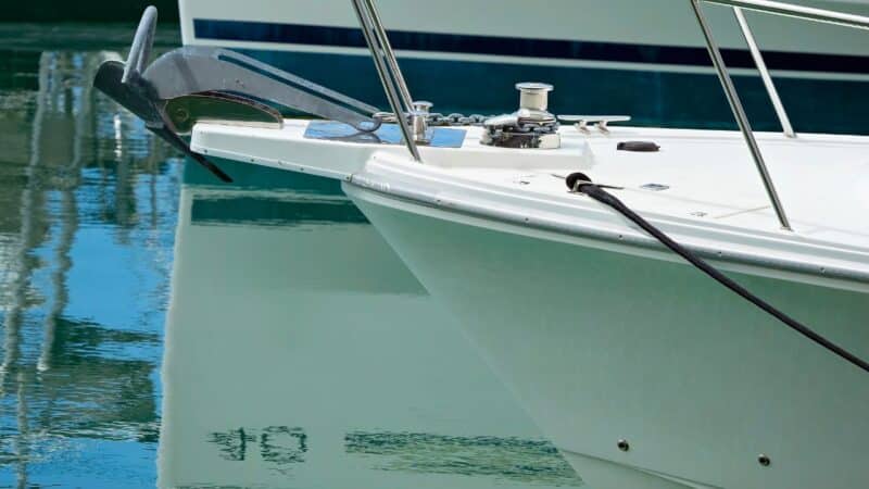 a rocna anchor on the bow of a sailboat