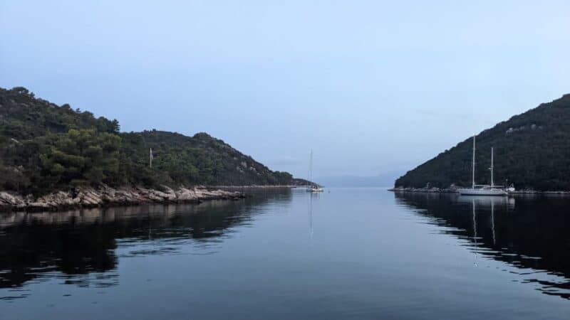 sailboats at anchor using lithium marine batteries to power their lights