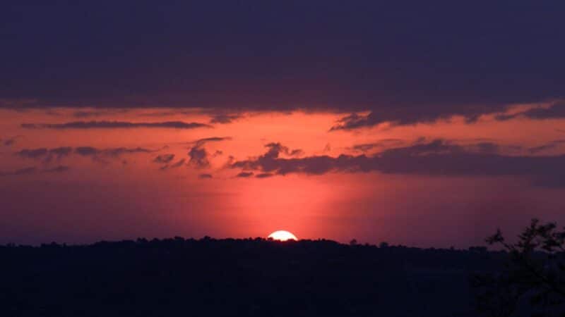 the sunset over the plains of tanzania