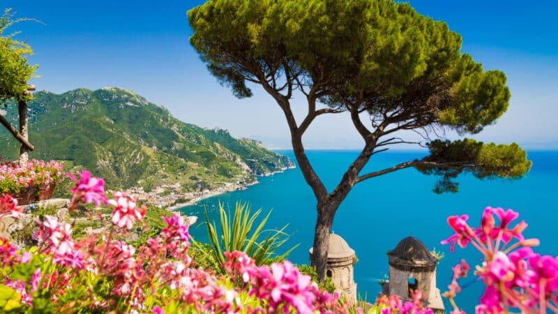 a view out to sea over the italian coast when trying to decide between north vs south italy