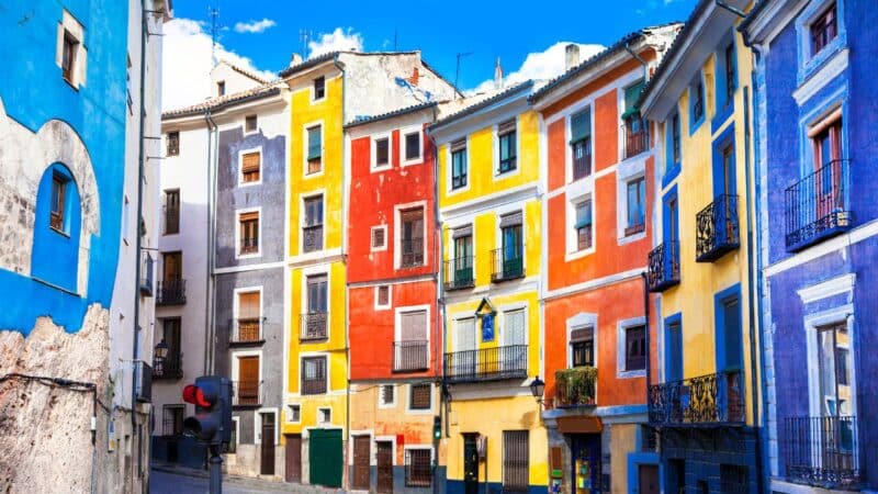 colourful houses in a spanish town at the best time to visit spain
