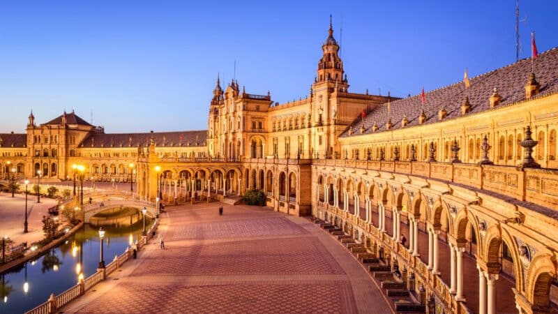 a beautiful spanish building at sunset