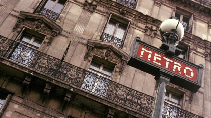 a building in paris outside a metro station