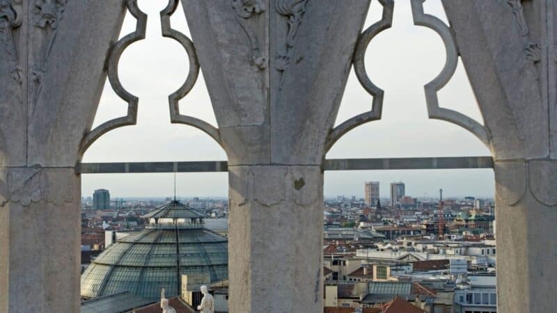 the view through the windows overlooking the city of Milan in Italy