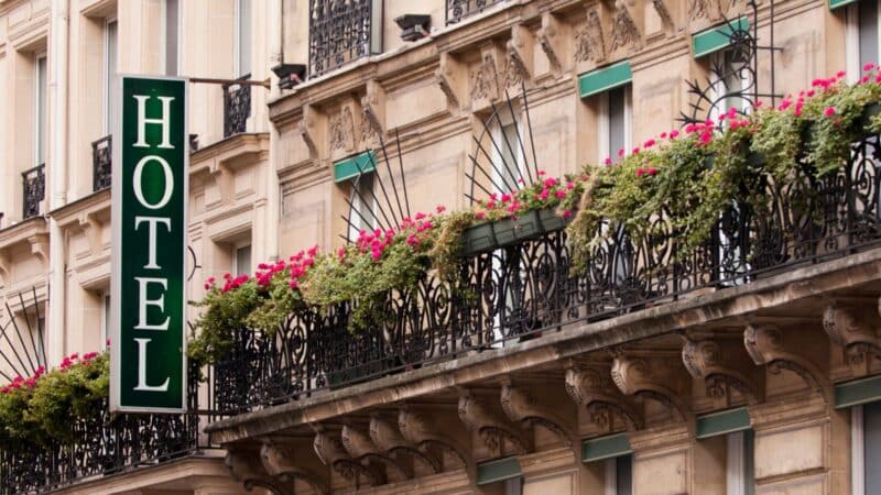 a hotel sign on a building in paris