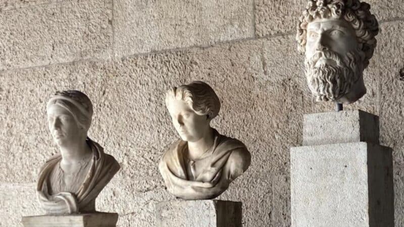 some heads of statues in a museum in athens that's worth visiting
