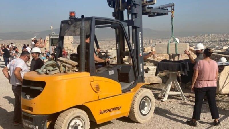 a digger doing excavation work in athens