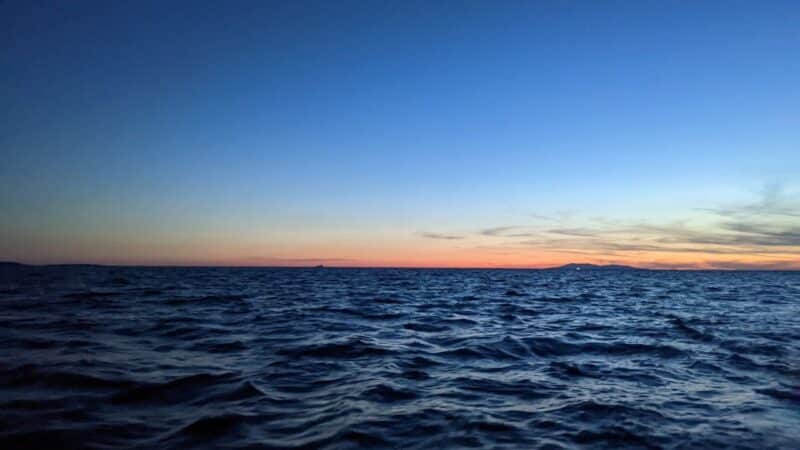 a beautiful sunset at sea inspiring quotes about the ocean