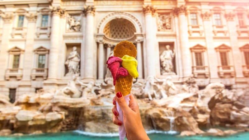 a gelato infront of a fountain in rome